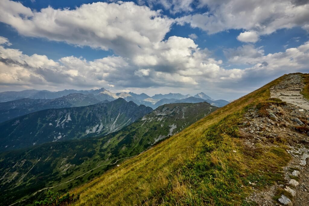 Explore stunning mountain landscapes on a clear summer day.